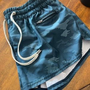 VUORI clementine shorts